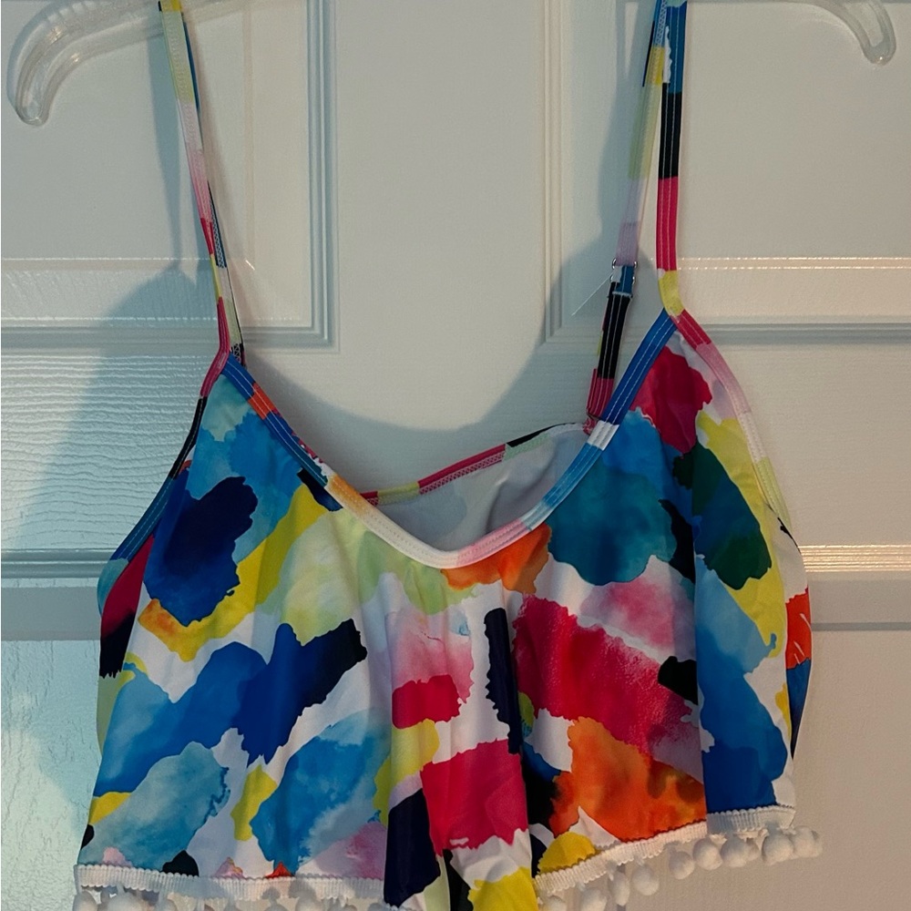 Colorful Pom-Pom Bikini Top and black swimsuit bottoms, size XL.
